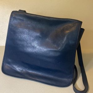 C&E Chesneau all leather unlined flap close cross body purse.